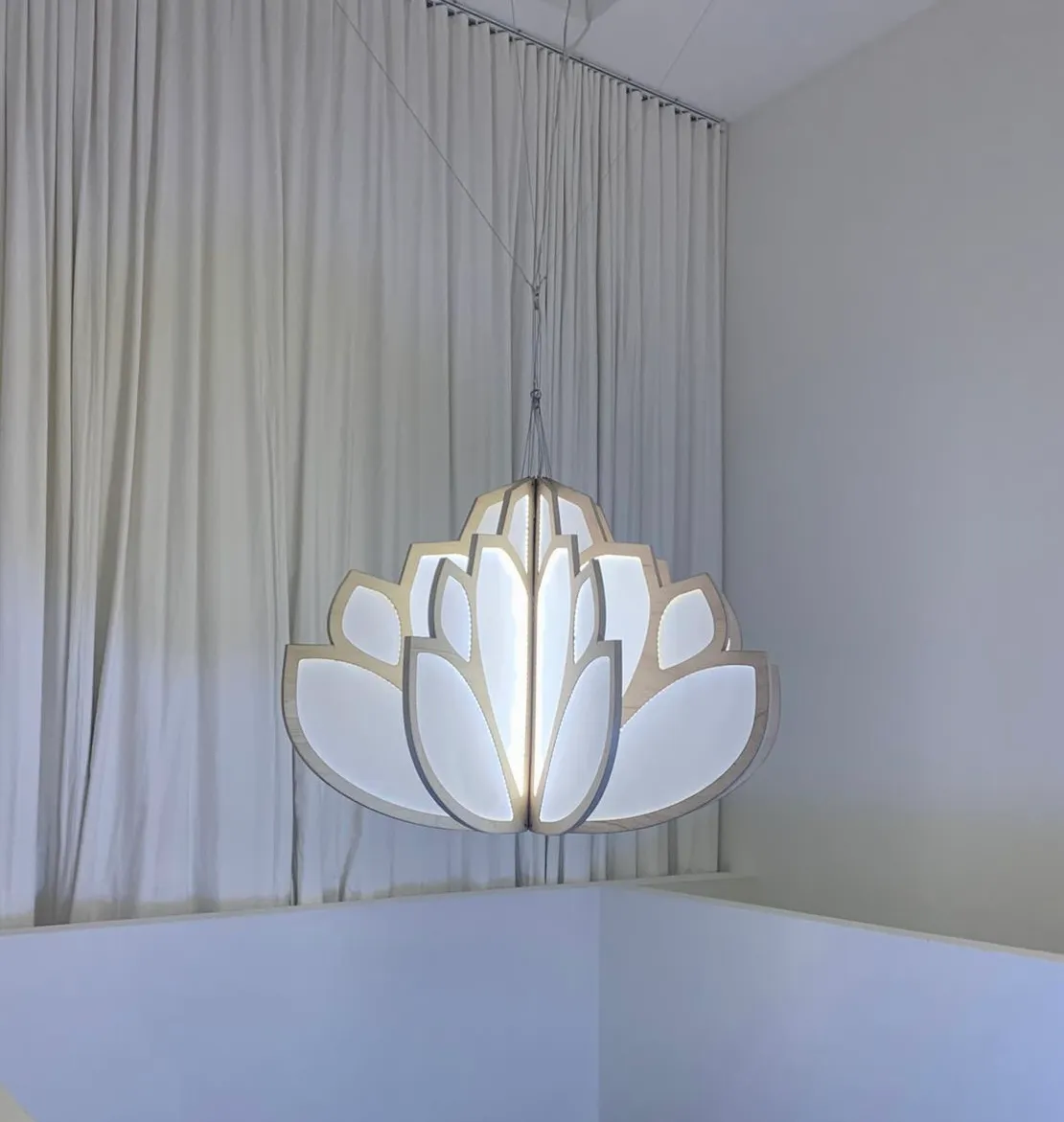 Komorebi lotus light glowing softly in a room